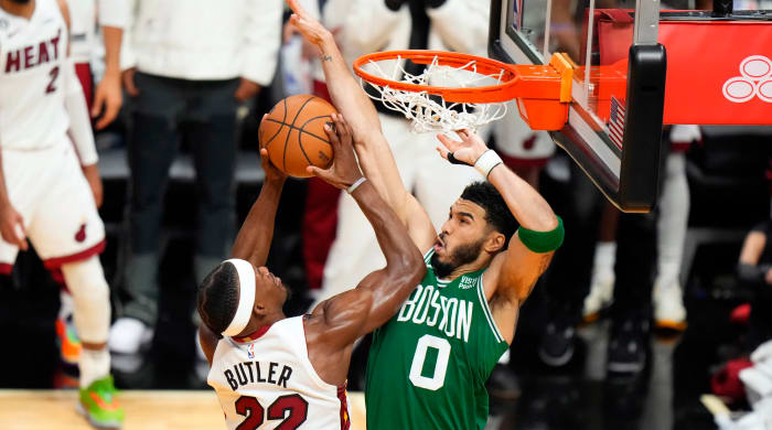 Jayson Tatum facing Jimmy Butler